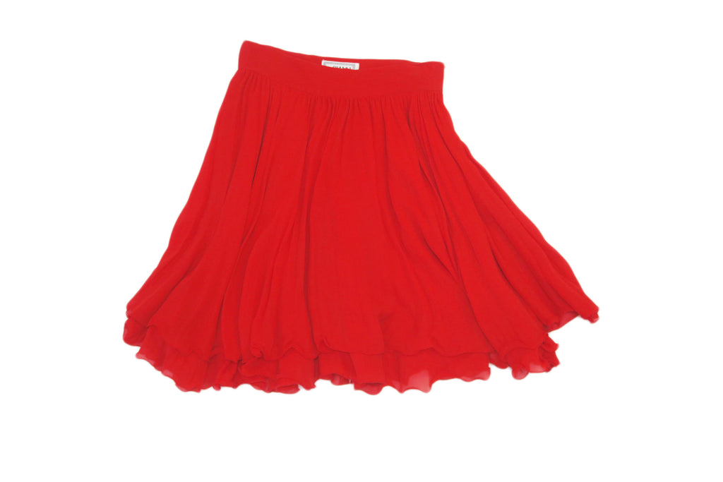 Gianni Versace falda roja vuelo