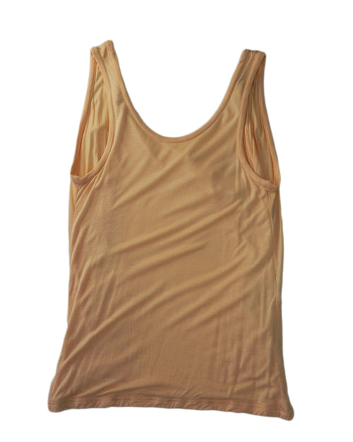 Balenciaga - camiseta salmon de tirantes y lazada de raso