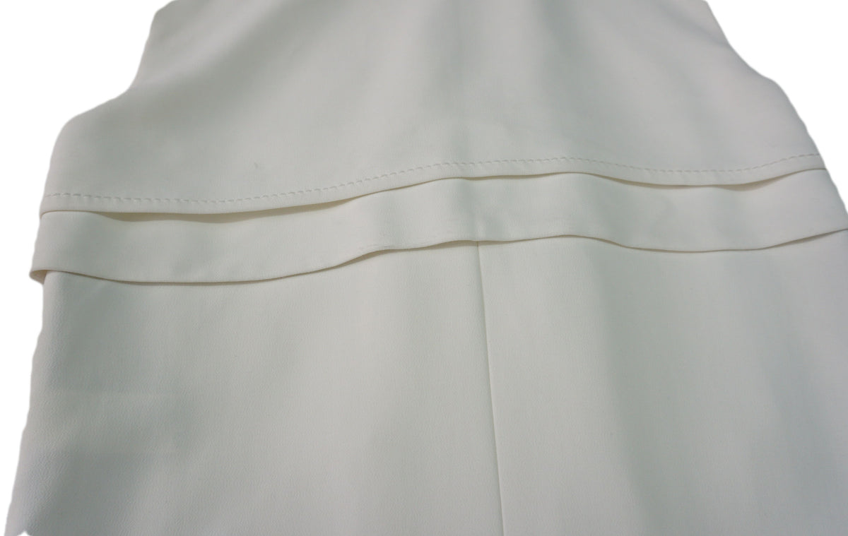 Costume National - Vestido sin mangas en blanco con cuello neopremo